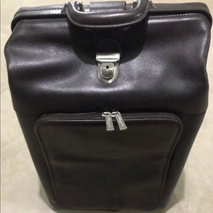 Kenneth Cole leather carry-on luggage